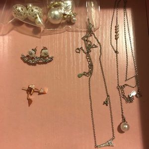 Four pair of earrings and two necklaces